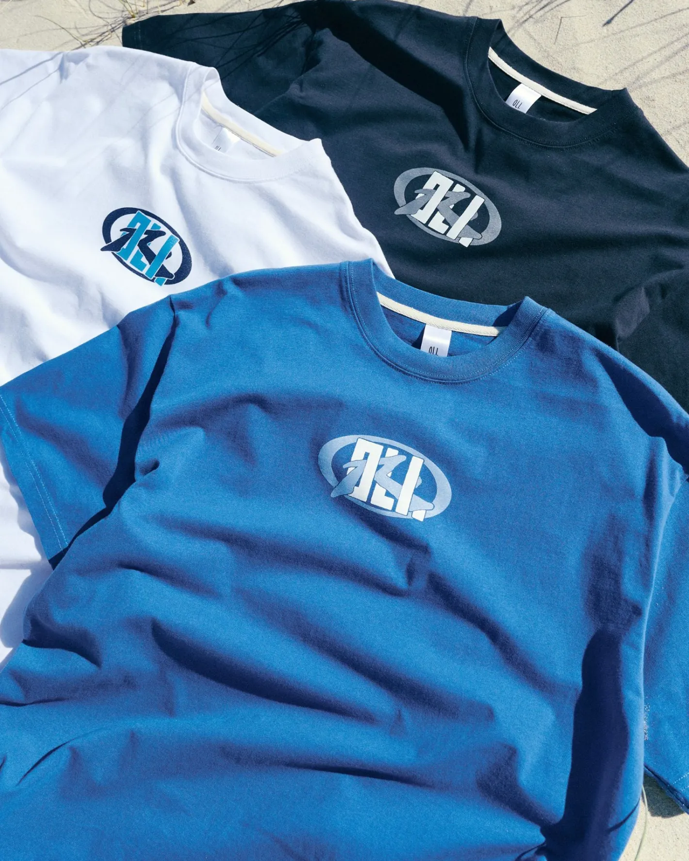 Shop Oli X Badge Tee Mens Tees
